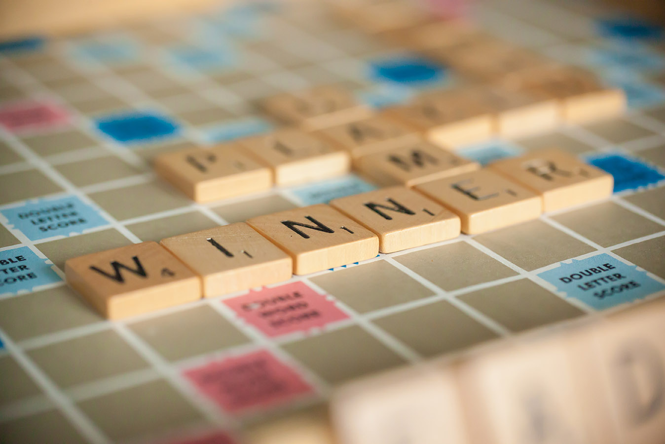 scrabble titles on a game board fftranscription